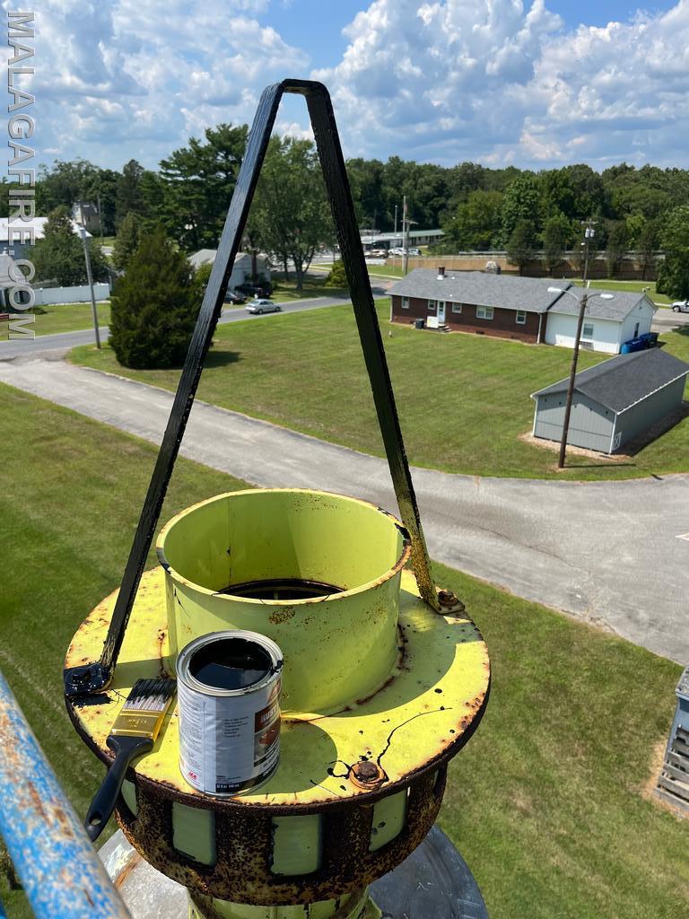 Siren and cover getting painted and remounted 