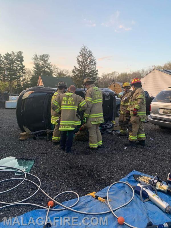 Members conducting an extrication drill at East Side Service on 4/15/24